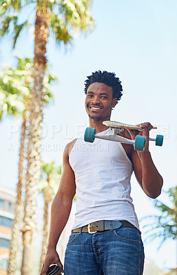 Buy stock photo Portrait of a young skater in the city