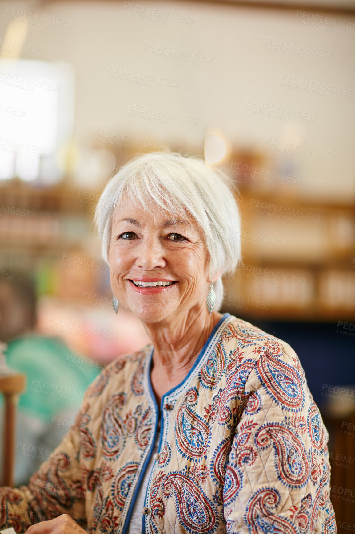 Buy stock photo Portrait of a smiling senior woman in a cafe