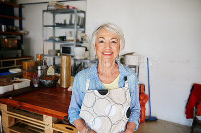 Buy stock photo Shot of a senior woman running a small business