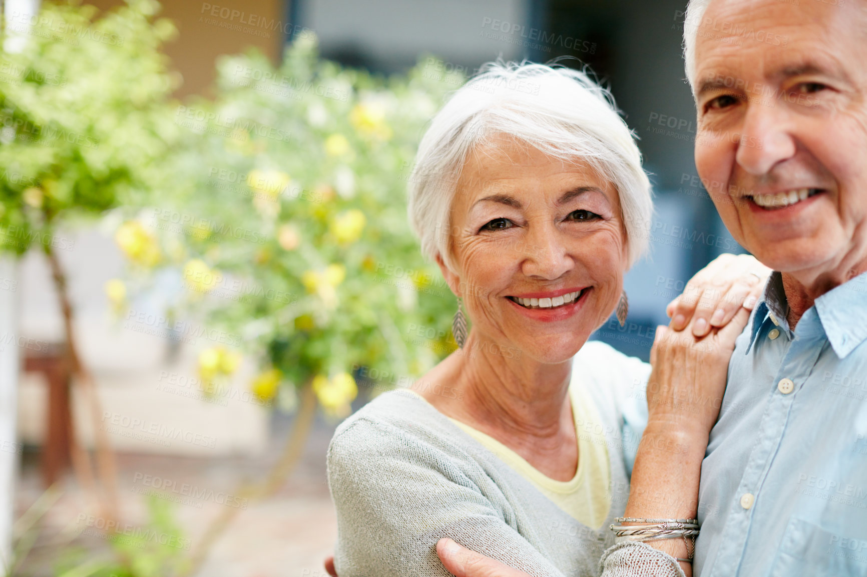 Buy stock photo Portrait of a happy senior couple outdoors