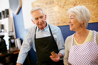 Buy stock photo Shot of a senior couple running a small business together