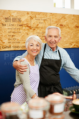 Buy stock photo Shot of a senior couple running a small business together