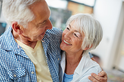 Buy stock photo Cropped shot of a loving senior couple at home