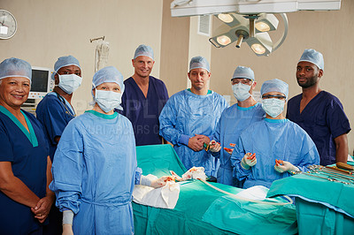 Buy stock photo Portrait of a team of surgeons in an operating room