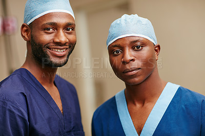 Buy stock photo Cropped portrait of two male nurses standing in a hospital