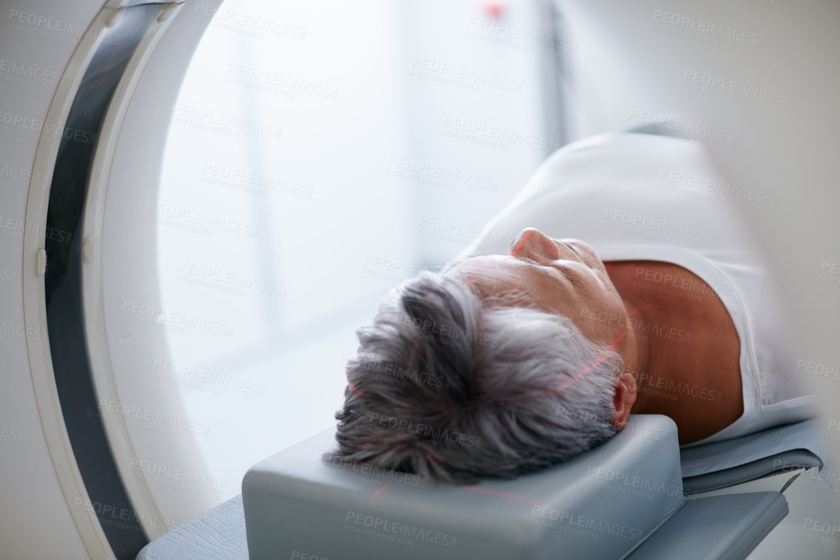 Buy stock photo Shot of a senior woman about to have an MRI scan