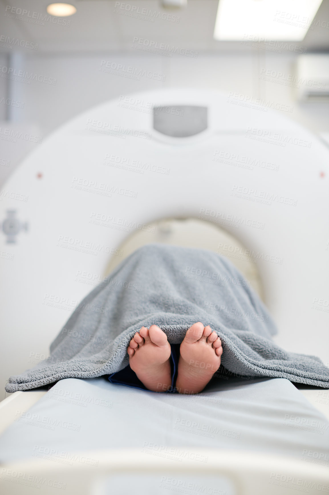 Buy stock photo Shot of a patient about to have an MRI scan
