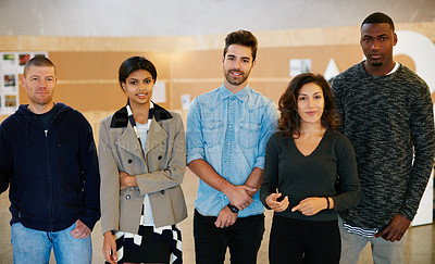 Buy stock photo Cropped portrait of a group of businesspeople standing in the office