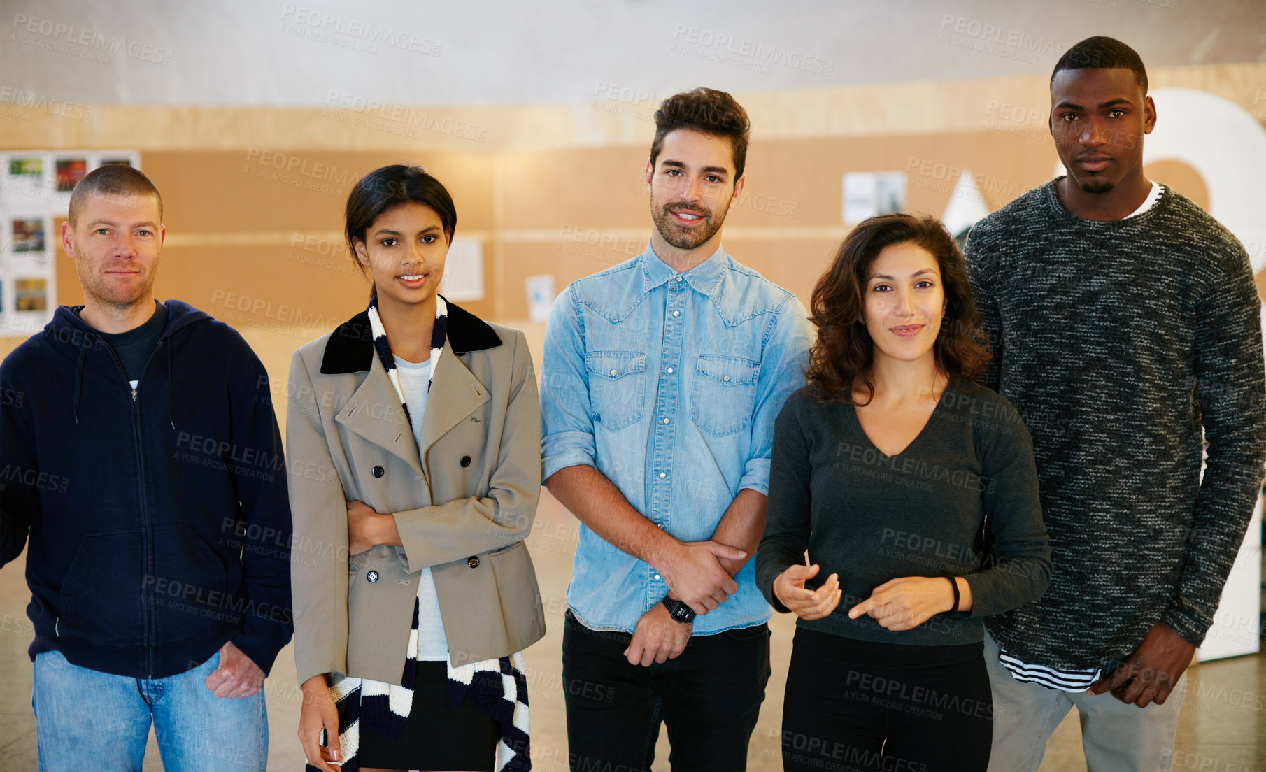 Buy stock photo Cropped portrait of a group of businesspeople standing in the office