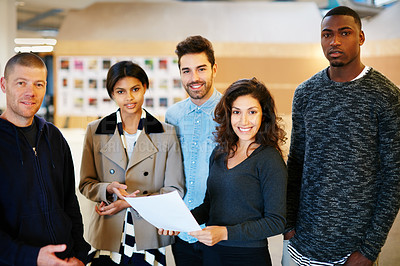 Buy stock photo Cropped portrait of a group of businesspeople standing in the office