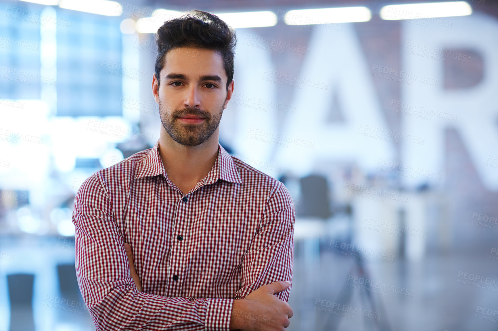 Buy stock photo Portrait of a young businessman at the office