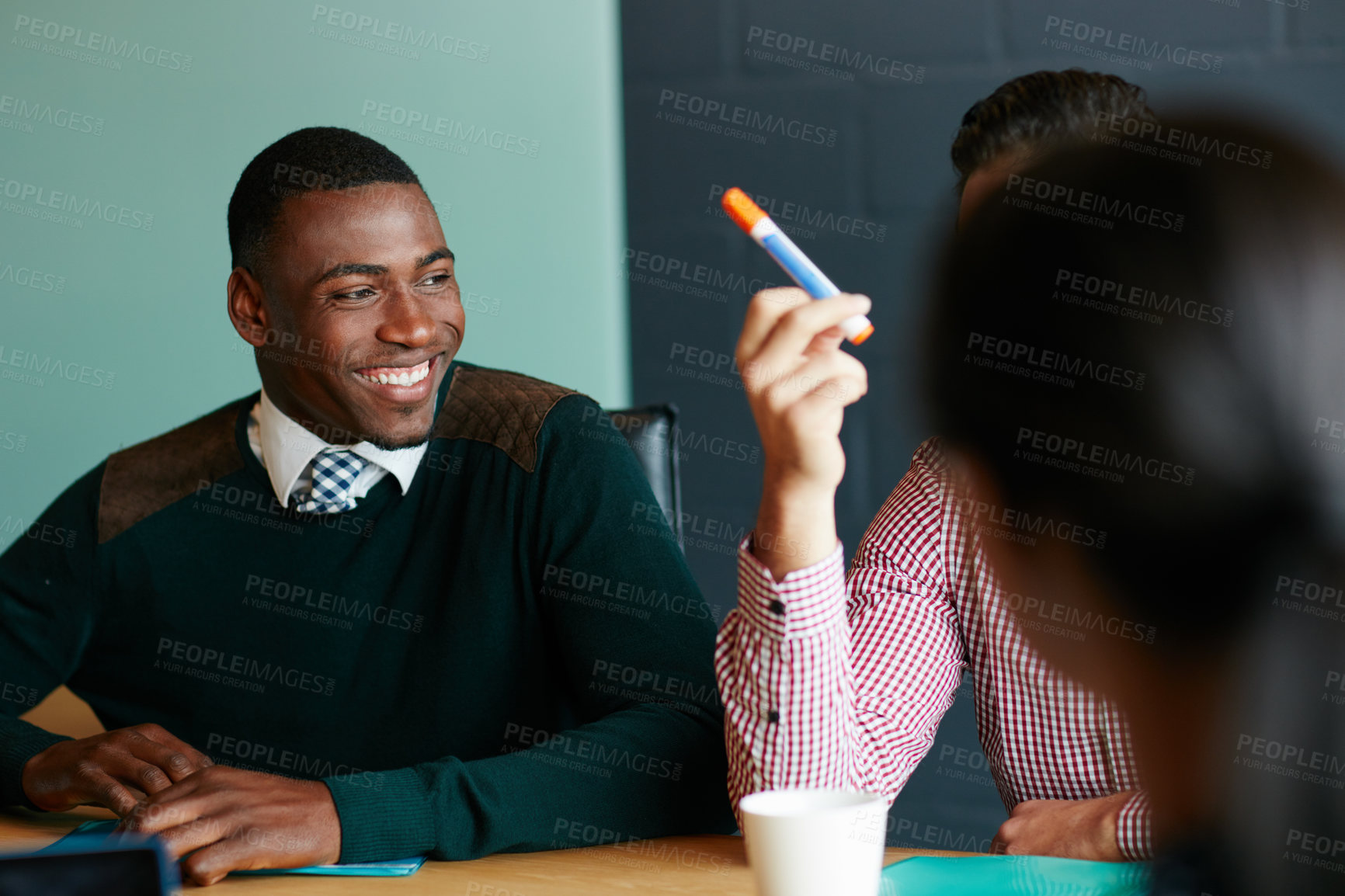 Buy stock photo Shot of a group of colleagues having a meeting in a boardroom