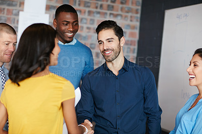 Buy stock photo Cropped shot of a group of businesspeople in the boardroom