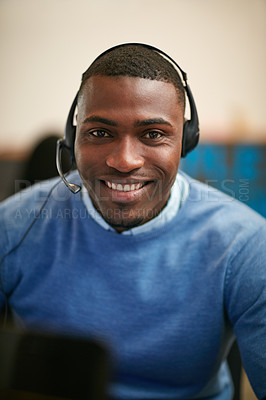 Buy stock photo Cropped portrait of a businessman wearing a headset in the office