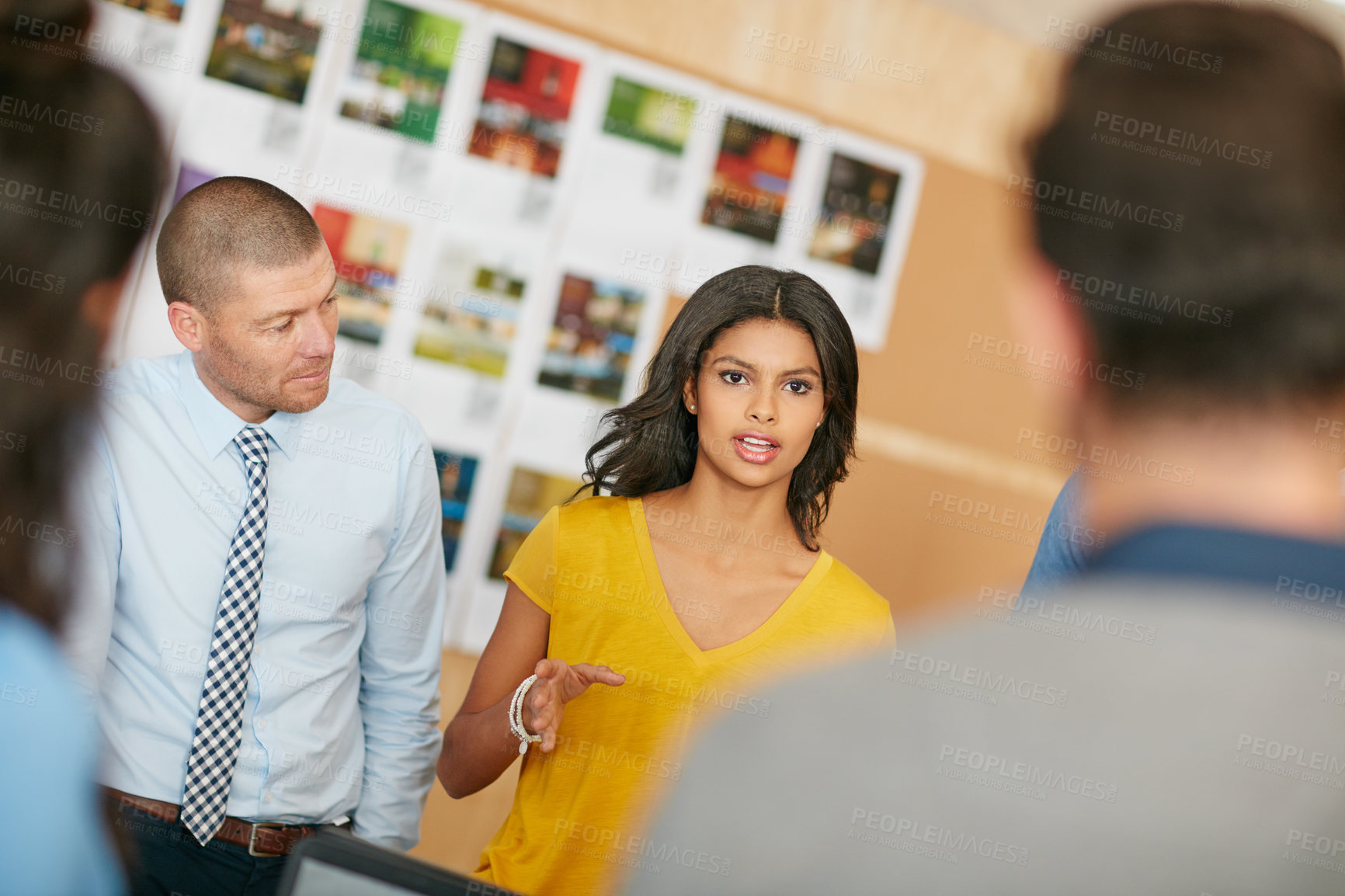 Buy stock photo Cropped shot of a group of businesspeople working in the office