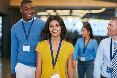 Buy stock photo Cropped shot of a group of businesspeople walking into work