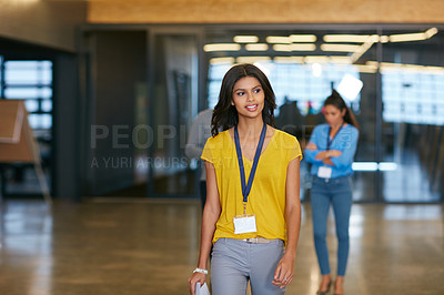 Buy stock photo Cropped shot of a young businesswoman walking into work
