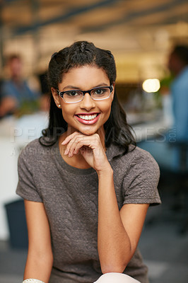 Buy stock photo Portrait of a confident young woman working in a modern office