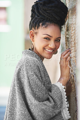 Buy stock photo Portrait of a fashionable young woman posing against a wall