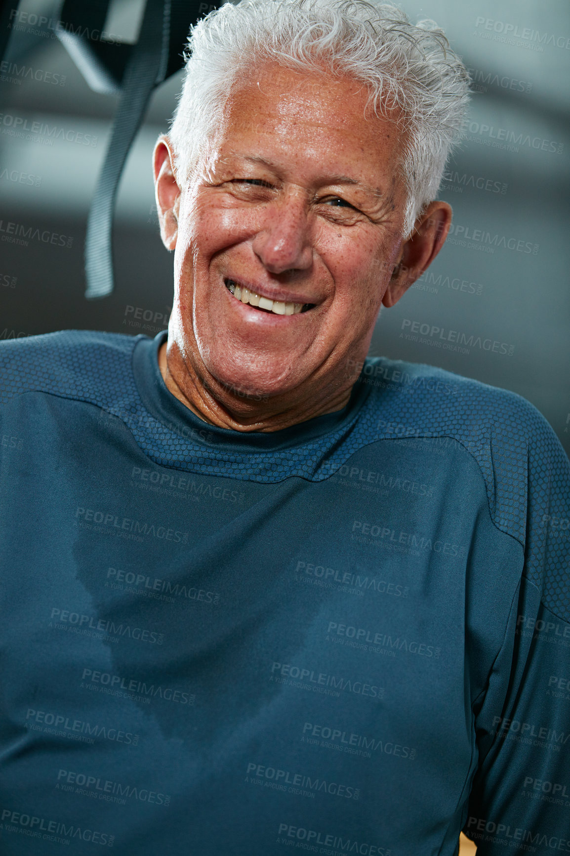 Buy stock photo Cropped shot of a senior man working out in the gym