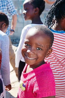 Buy stock photo Cropped portrait of a young child at a community outreach event