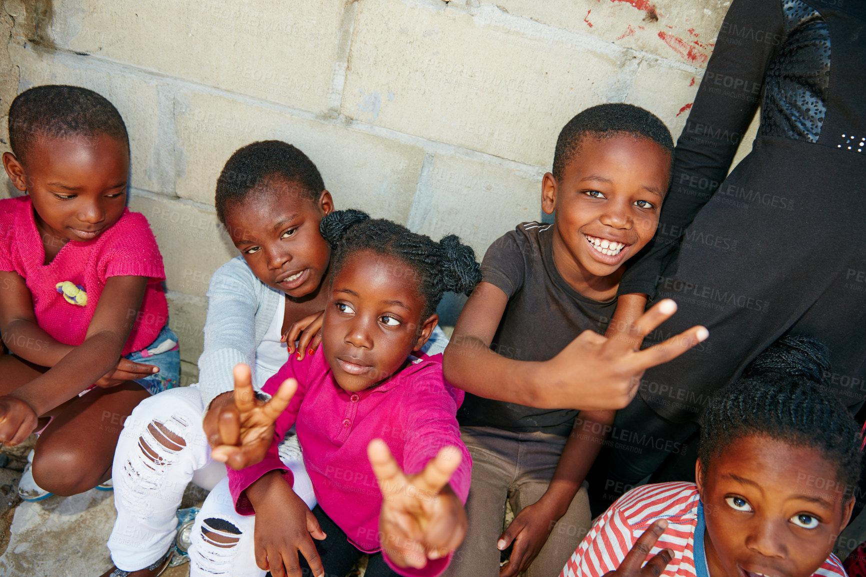 Buy stock photo Cropped portrait of a group of kids at a community outreach event