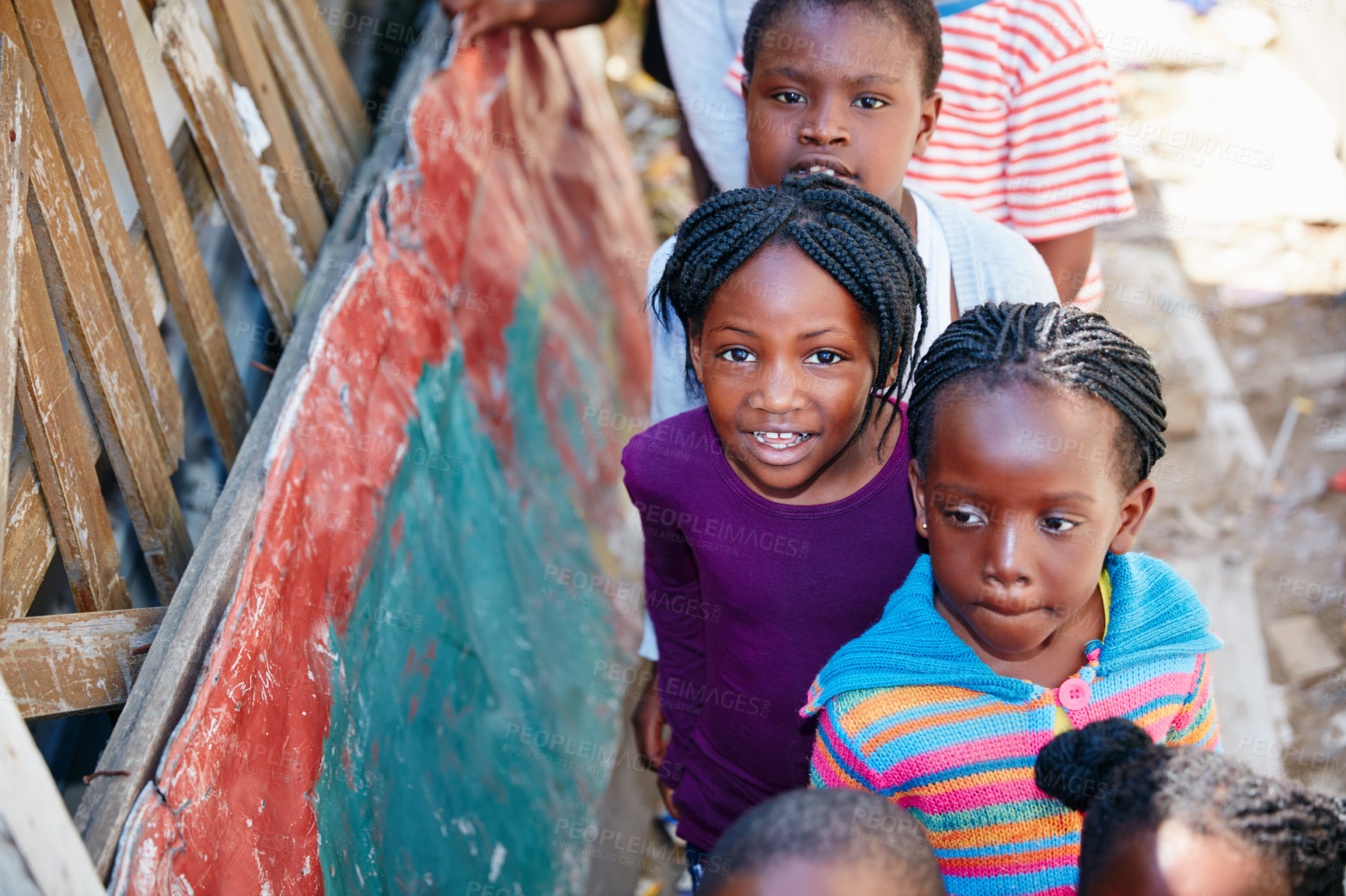 Buy stock photo Cropped portrait of a group of kids at a community outreach event