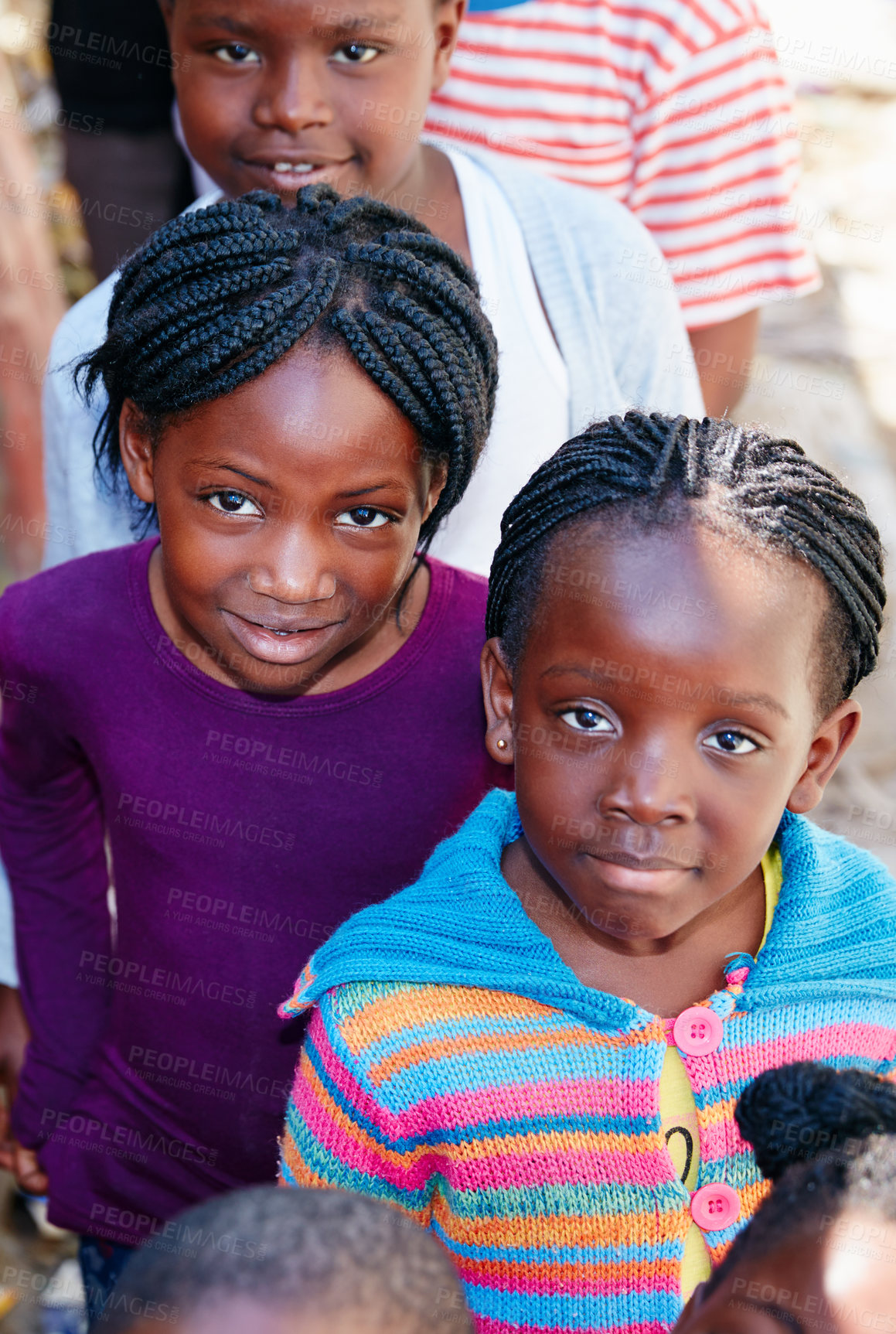 Buy stock photo Cropped portrait of a group of kids at a community outreach event