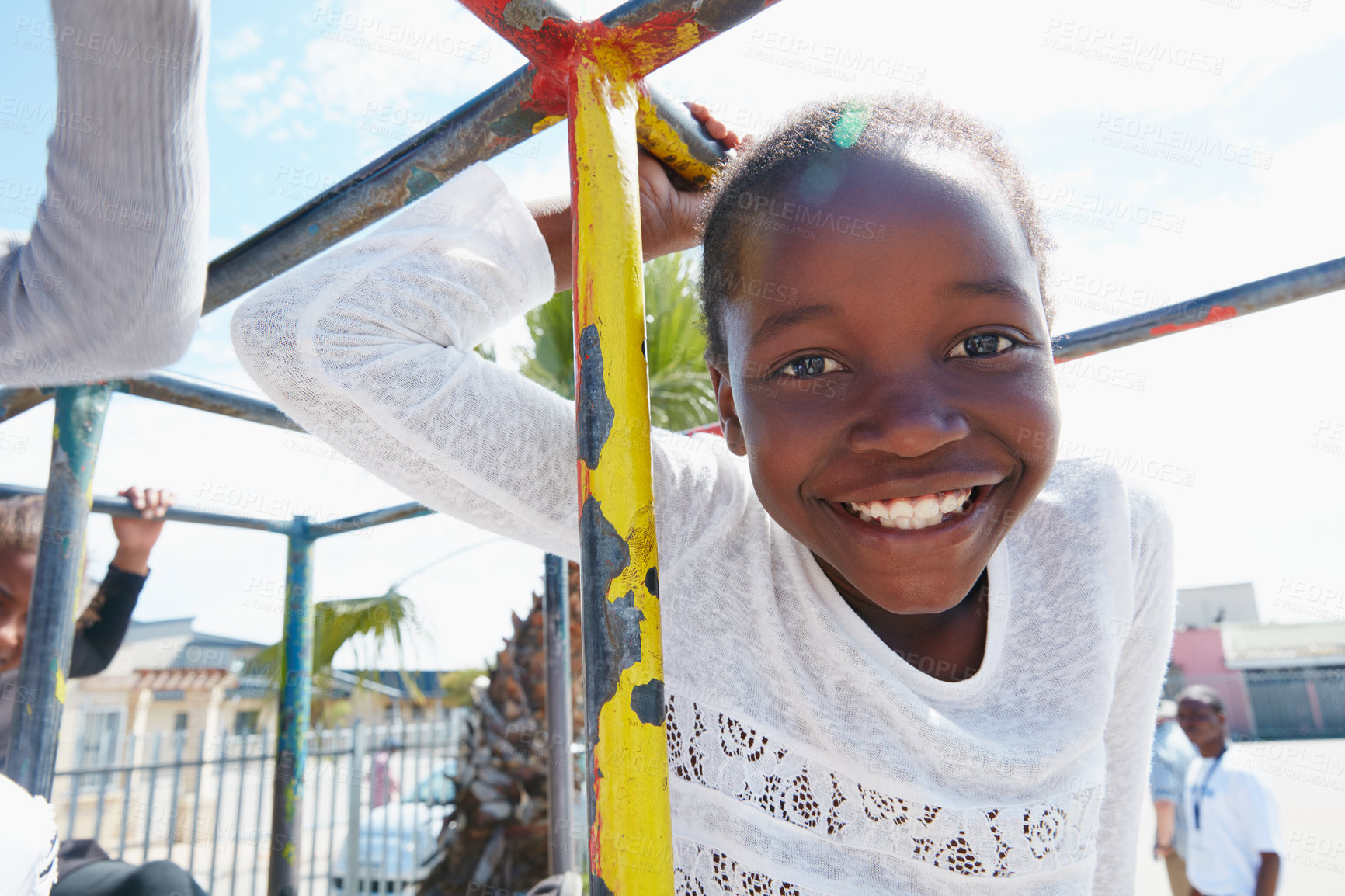 Buy stock photo Portrait of a happy little boy playing on a jungle gym