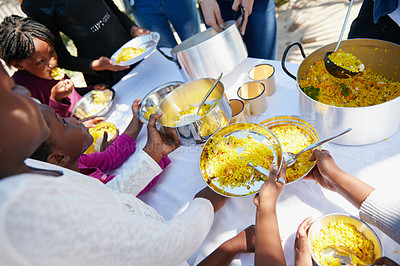 Buy stock photo Cropped shot of children getting fed at a food outreach