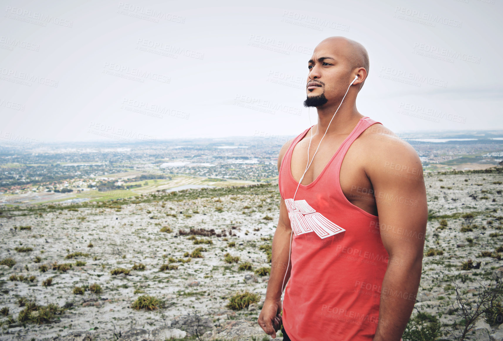 Buy stock photo Cropped shot of a muscular young man exercising outdoors