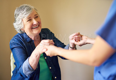 Buy stock photo Shot of a resident and a nurse at a retirement home