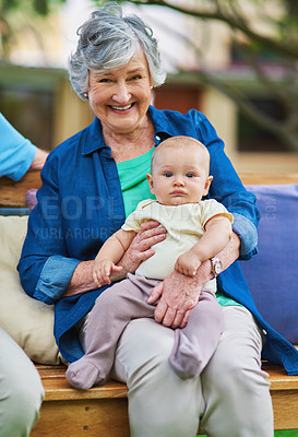 Buy stock photo Cropped shot of a baby boy with his family outdoors
