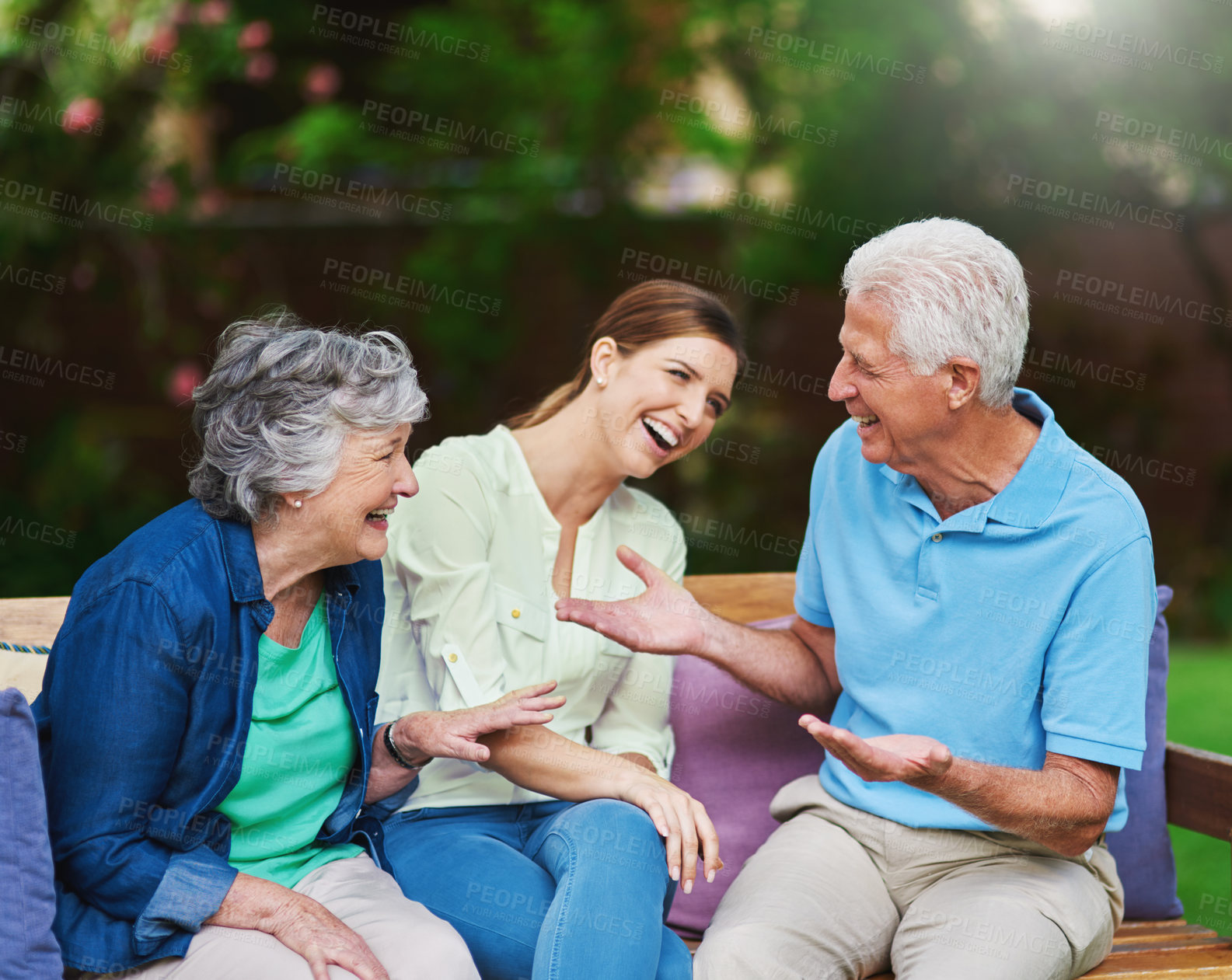 Buy stock photo Outdoor, senior parents and woman with laughing for talking, connection and bonding together as family. Mother, father and adult daughter with love embrace for joke, funny memory and smile in nature