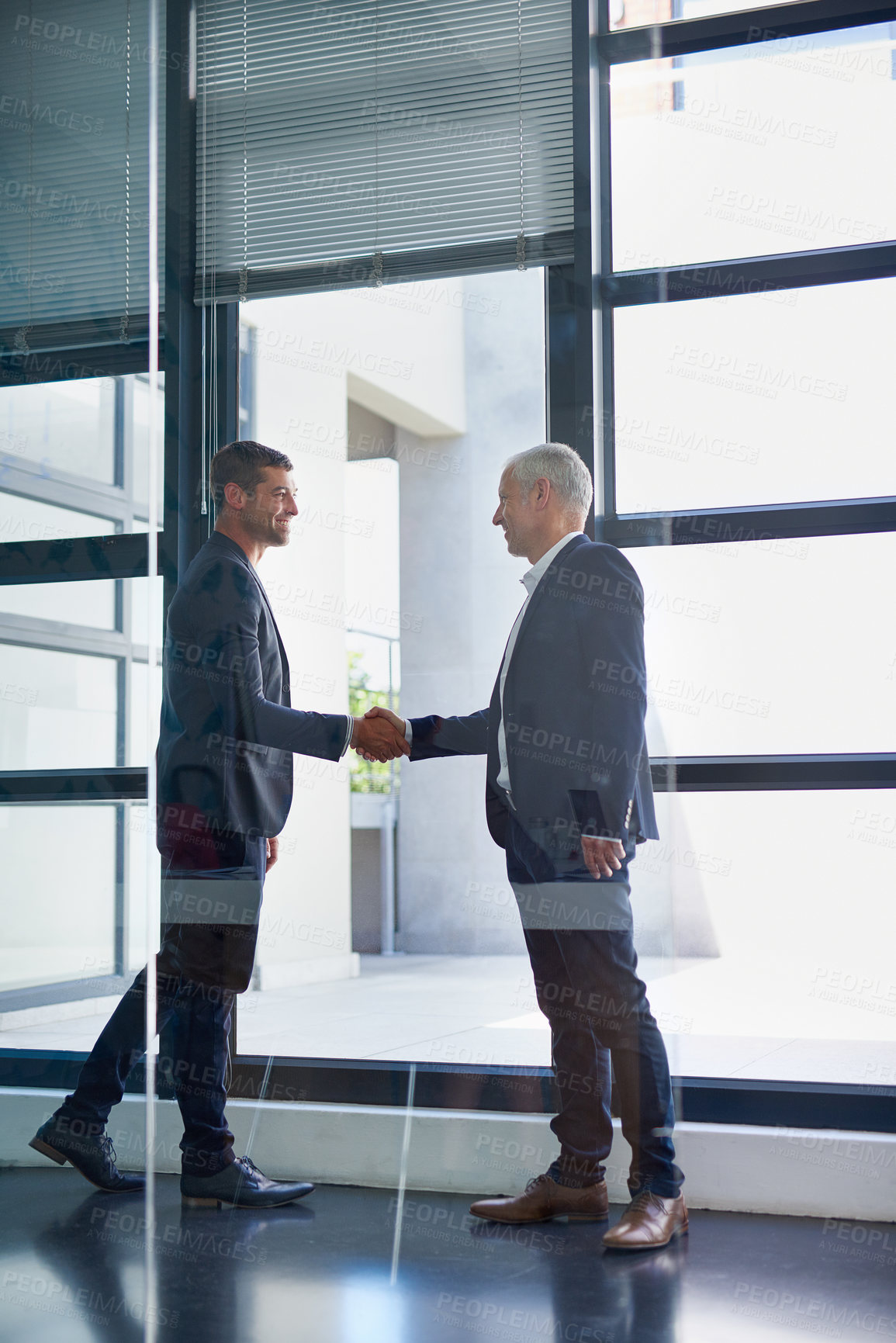 Buy stock photo Business men, handshake and meeting in office with agreement, work deal or partnership. Greeting, welcome and onboarding at corporate company with professional contract and thank you at law firm