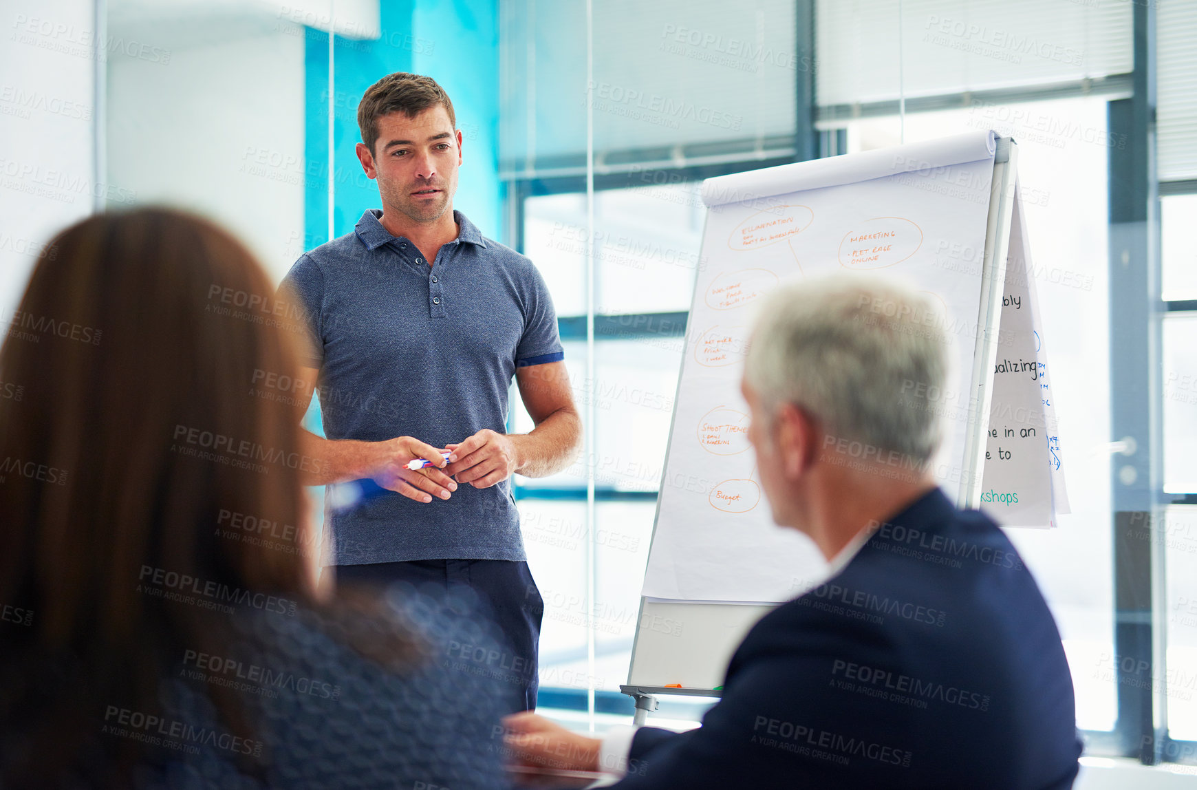 Buy stock photo Meeting, team and businessman at whiteboard with presentation for planning videography project or content creation. Small business, game plan and people in office with brainstorming production ideas