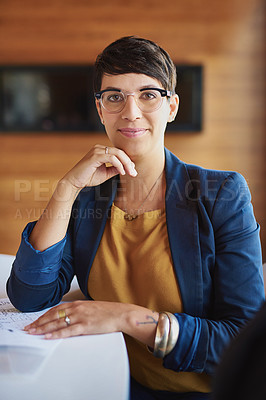 Buy stock photo Cropped portrait of a businesswoman sitting in the boardroom