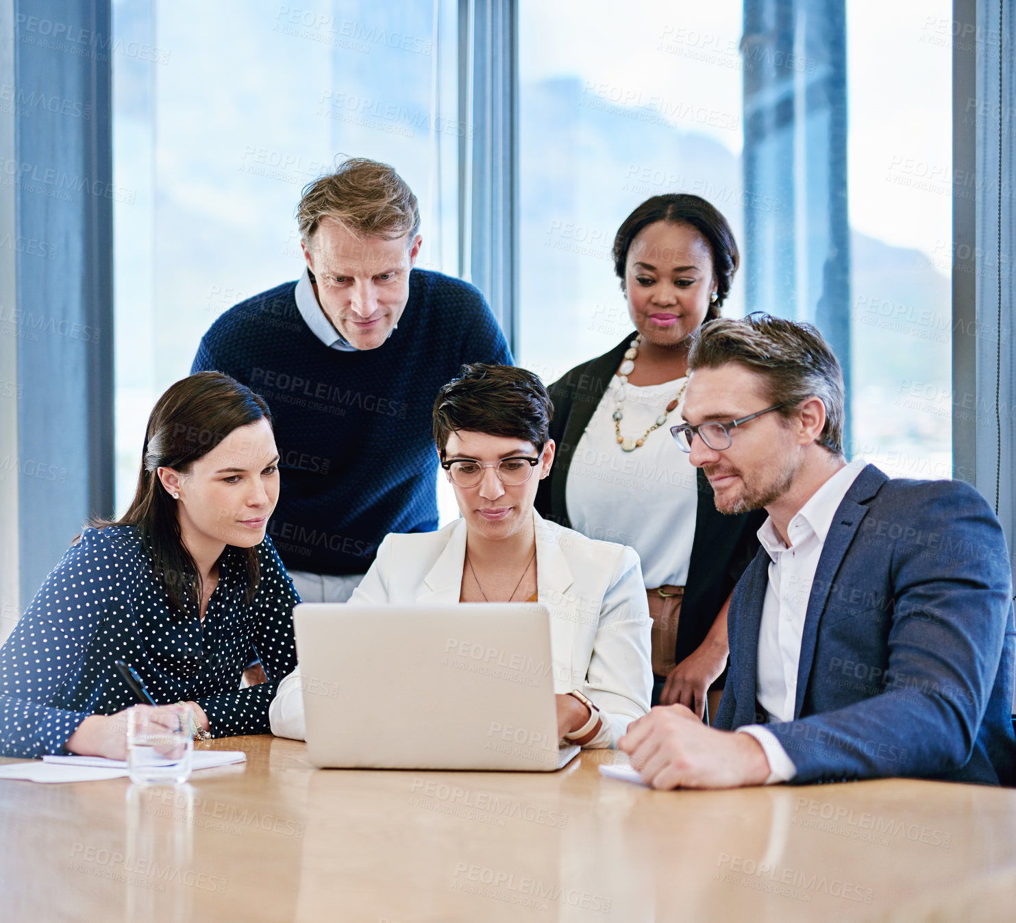 Buy stock photo Cropped shot of corporate businesspeople meeting in the boardroom