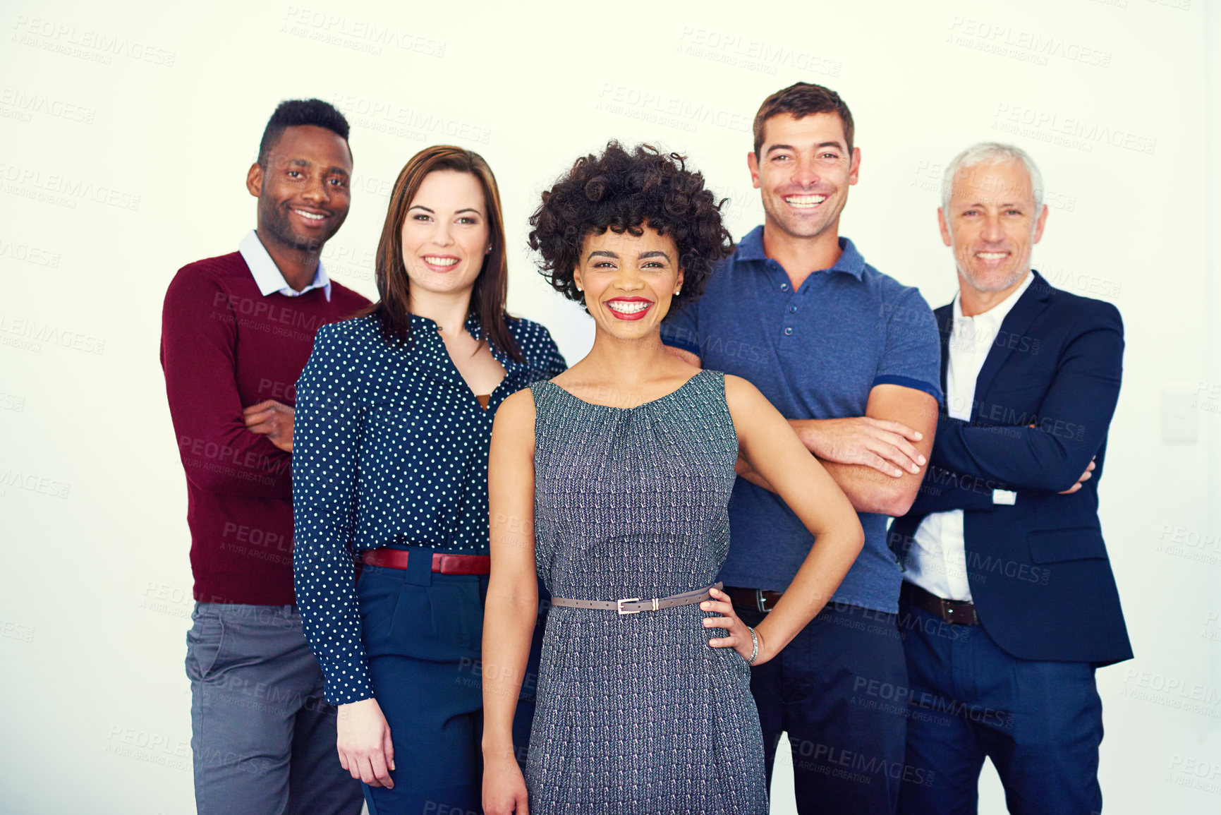 Buy stock photo Cropped portrait of a group of businesspeople standing in the studio