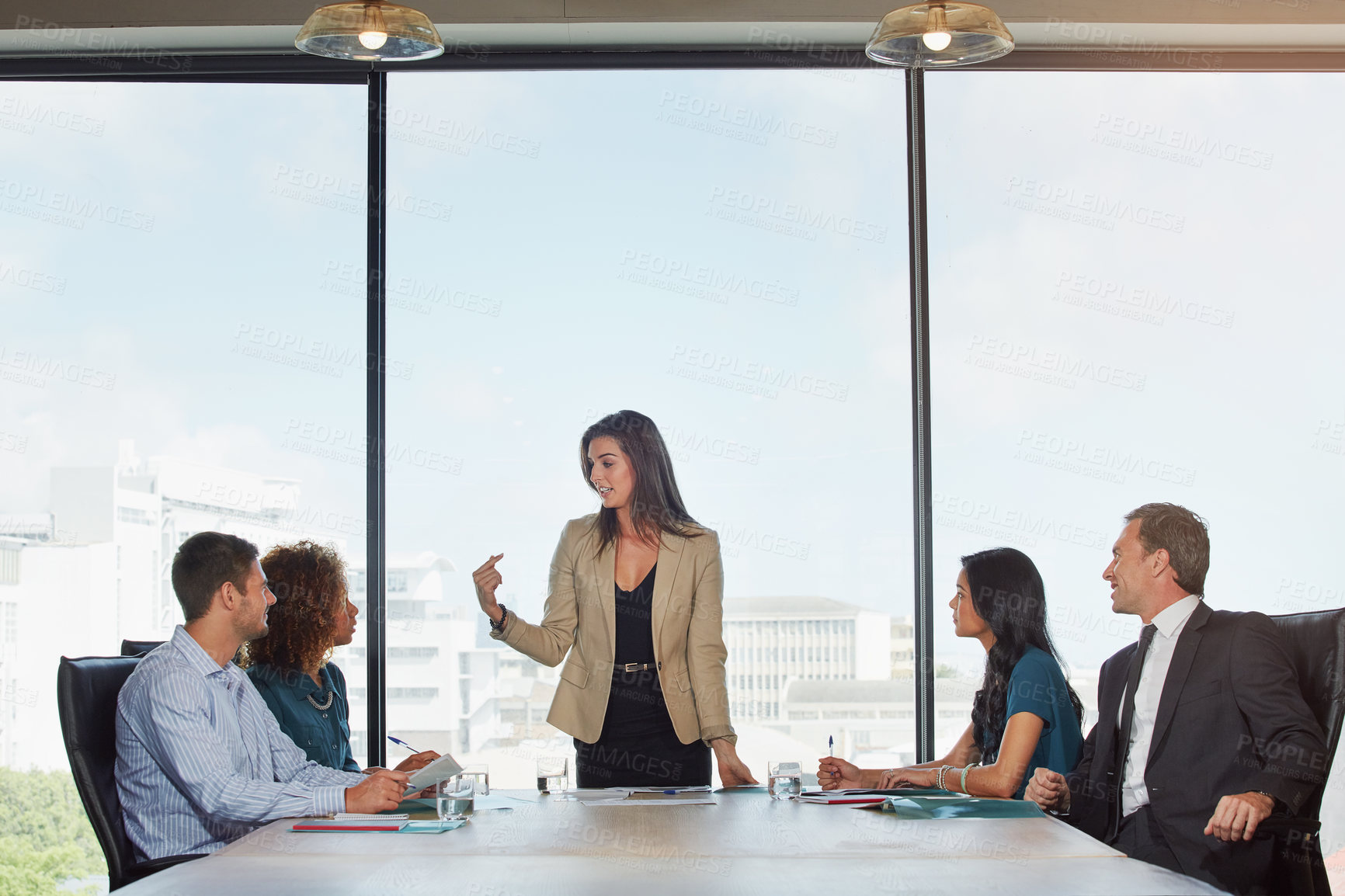 Buy stock photo Shot of a group of businesspeople in a meeting