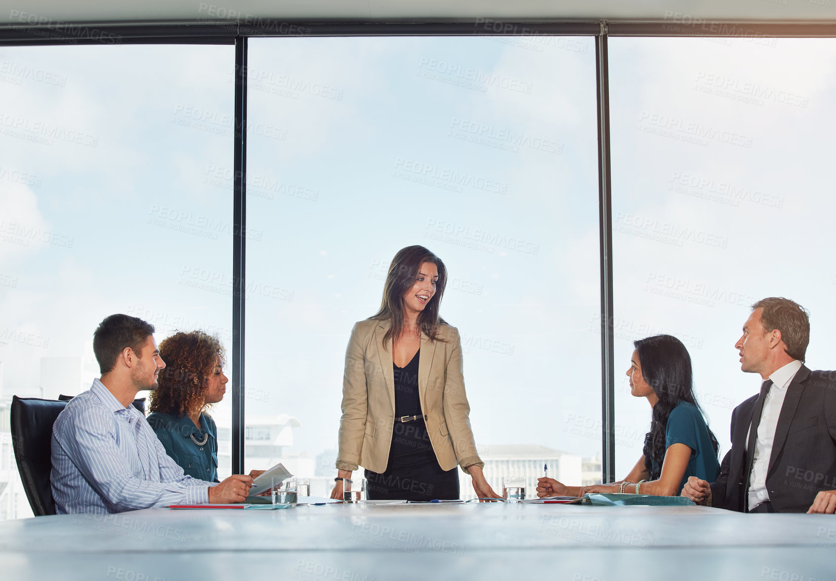 Buy stock photo Shot of a group of businesspeople in a meeting