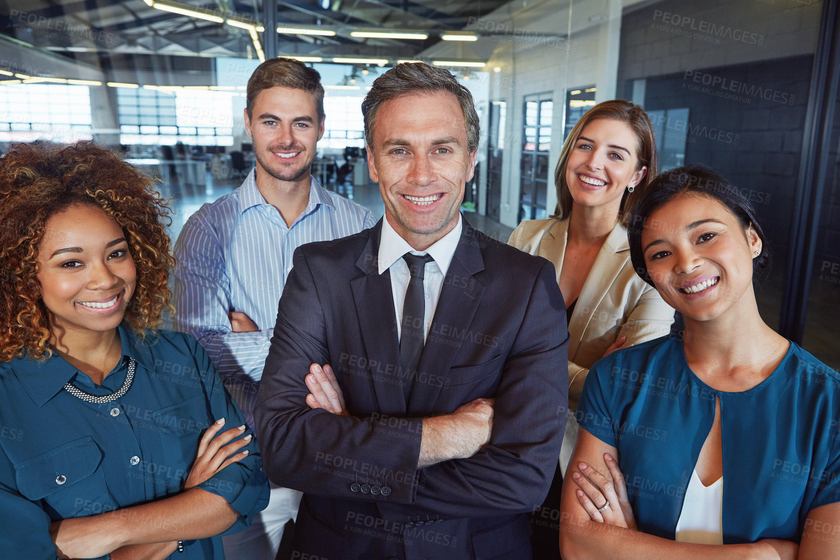 Buy stock photo Portrait of a team of professionals standing together in an office