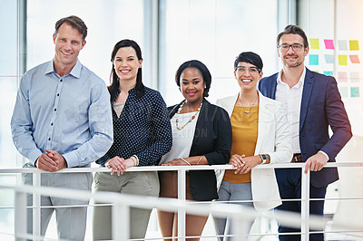 Buy stock photo Cropped portrait of five business colleagues standing in the office