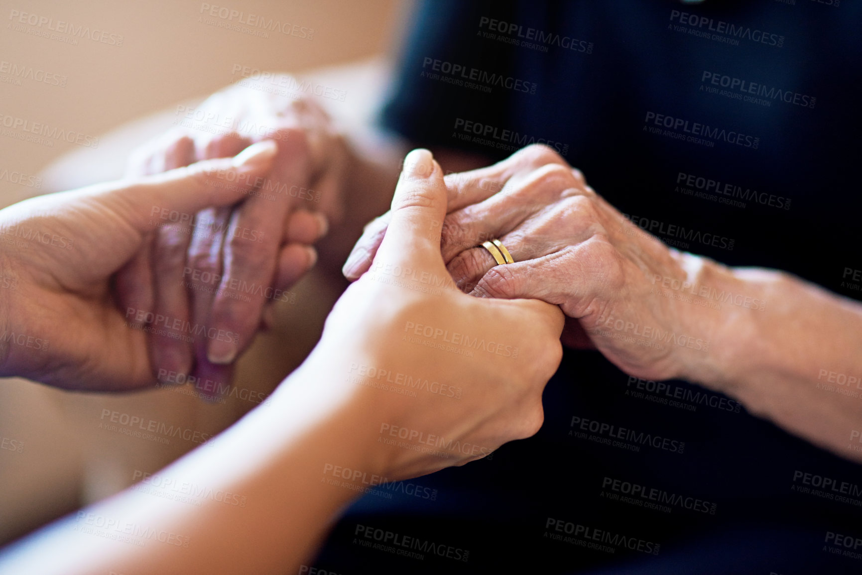 Buy stock photo Cropped shot of a person holding an elderly woman’s hands