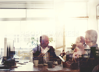 Buy stock photo Multiple exposure shot of a white business group working together superimposed over an industrial area. Colleagues showcasing teamwork, collaboration and planning in a meeting in the boardroom.
 