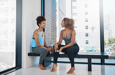 Buy stock photo Full length shot of two young women talking after yoga class