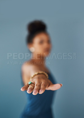 Buy stock photo Cropped shot of a young woman practising yoga