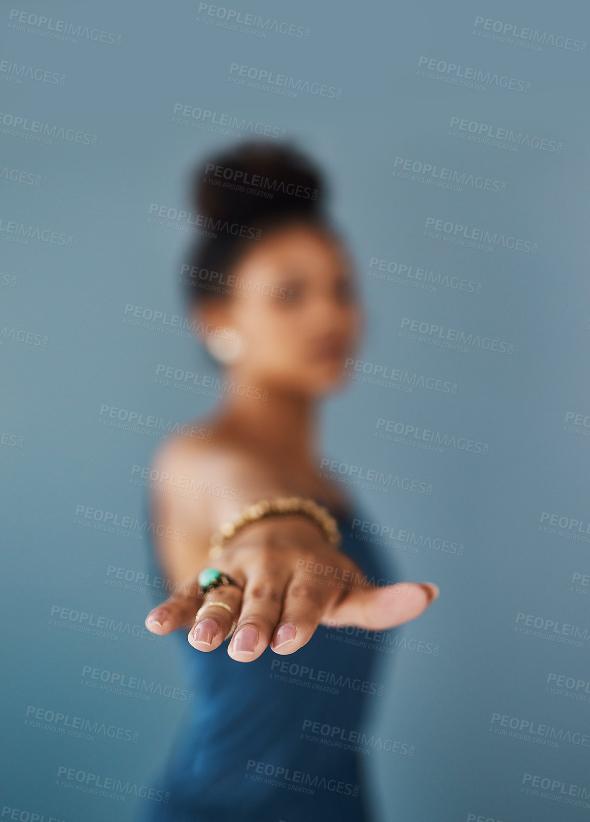 Buy stock photo Cropped shot of a young woman practising yoga