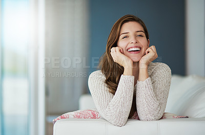 Buy stock photo Portrait, happy and woman relax on sofa in home living room laughing at comedy. Face, smile or excited female person from Canada on couch in lounge, apartment or house to enjoy me time, joke or funny