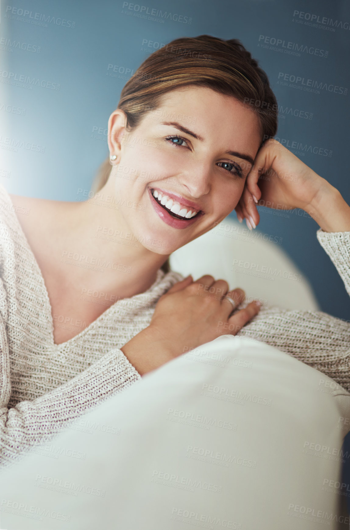 Buy stock photo Happy, portrait and wellness with woman on sofa in living room of home for comfort, rest or weekend time off. Flare, relax and smile with face of person sitting on couch in lounge for stress relief